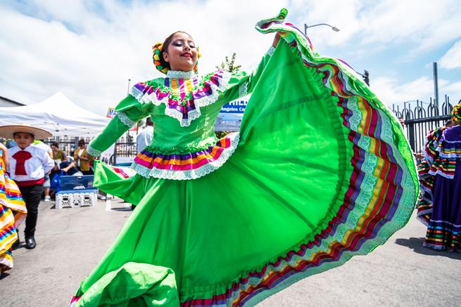 Woman dancing in traditional dress