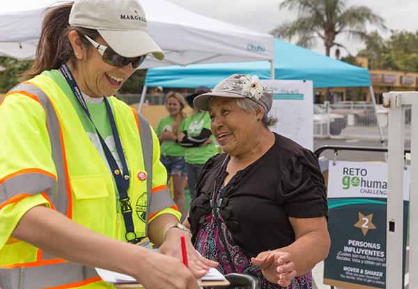 Volunteer helping event goer